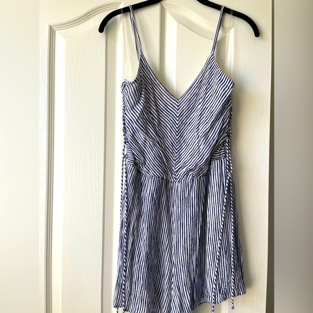 Never worn perfect condition blue and white double lined romper
